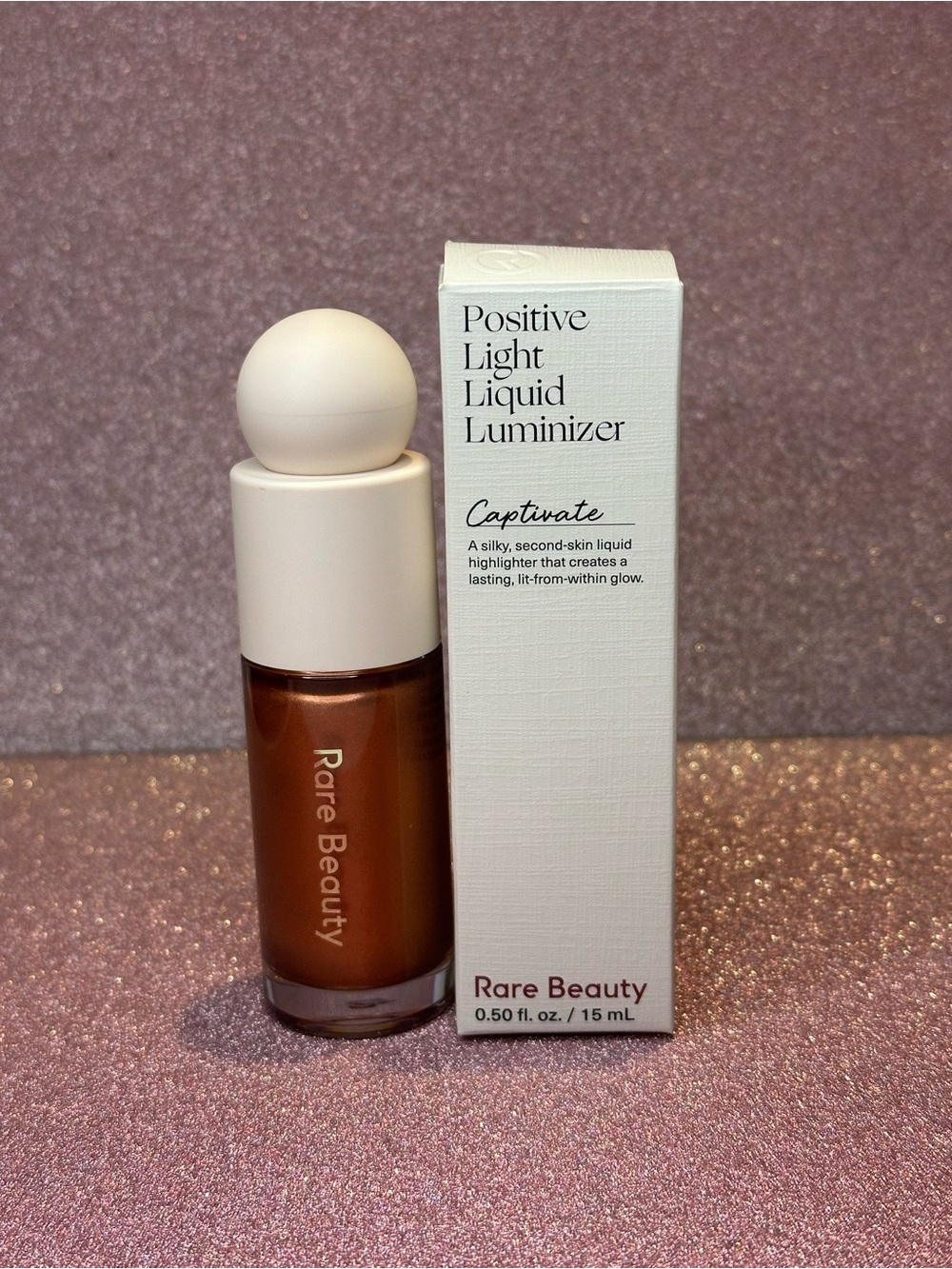 Rare Beauty Positive Light Liquid Luminizer “Captivate”